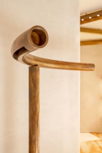 A modern, curved metal staircase with an elegant design.
