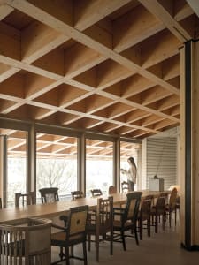 Modern interior design with extensive use of wood materials.