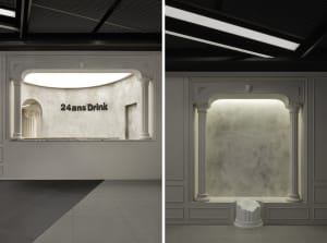 Modern bar interior with concrete walls and lighting, designed for an elegant and sophisticated atmosphere.