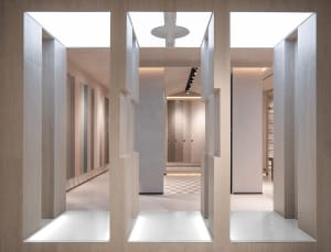 A modern retail space featuring glass and marble elements.