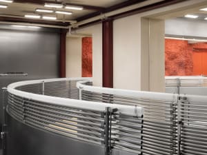 Modern retail space featuring metallic structural columns and an industrial aesthetic