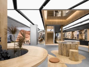 A modern retail storefront with wooden elements and a sleek, minimalist design.