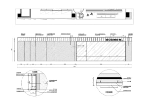 A detailed blueprint of a modern office space featuring glass walls and metal elements.