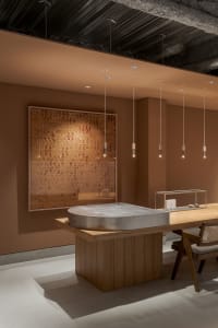 Modern minimalist interior design with a focus on hardwood materials and sleek, clean lines.