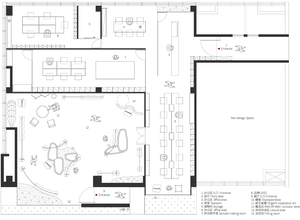 Industrial office space with concrete, metal, and glass materials.