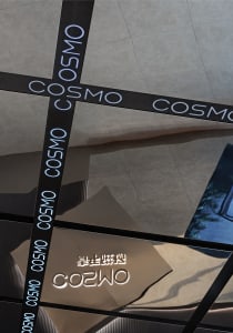 Modern interior featuring glass cross-lights and mirrored surfaces.