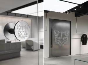 Modern storefront with metal material and cat head design.