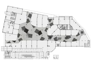 A modern office space with a concrete bluespot floor plan.