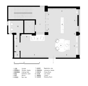A detailed architectural drawing showing the layout of a modern office space, including various functional zones and furnitur