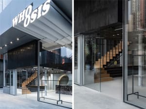 Modern retail storefront featuring an industrial UFO design with wooden elements, metal accents, and glass.