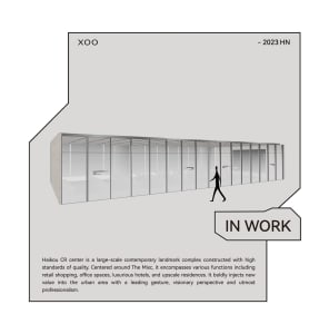 A modern office interior with glass walls and a minimalist design.