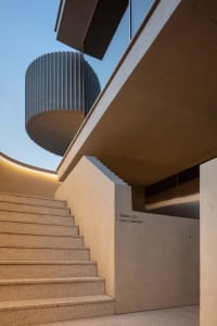 Concrete wall staircase with a modern architectural design.