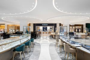 A modern retail jewelry store featuring marble and glass