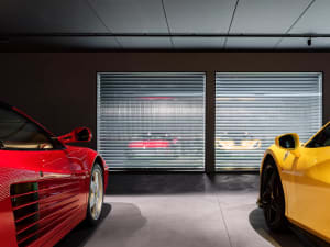 Ferrari showroom with metallic interior design.