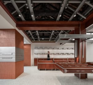 Modern retail storefront featuring a combination of wooden and metallic materials