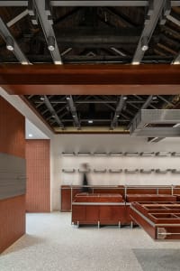 Modern retail storefront featuring wooden elements