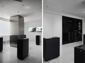 A modern office space featuring concrete and metal elements.