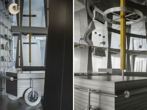 Industrial-style modern kitchen featuring metallic surfaces and minimalist design.