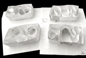 Black and white architectural models made of paper