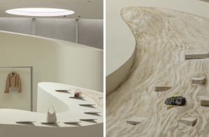 A minimalist interior space featuring sandstone and marble materials.