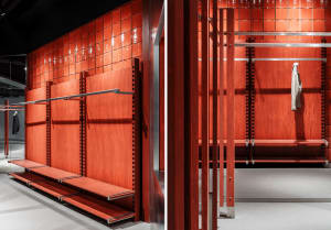 Modern retail space featuring minimalist interior design with wood and metal materials, showcasing clean lines and functional