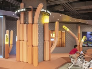 An interior design space featuring modular wooden blocks