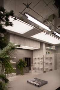 Industrial retail space with concrete walls and minimalist design
