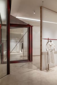 Modern retail space featuring glass door and glass walls