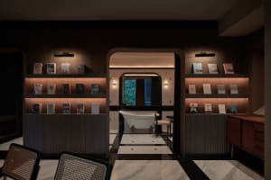 A modern lounge area featuring wooden elements and a cozy atmosphere.