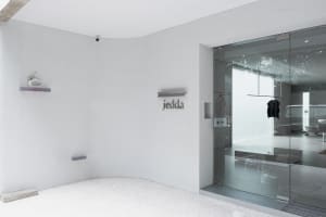 Modern retail storefront with glass and concrete materials