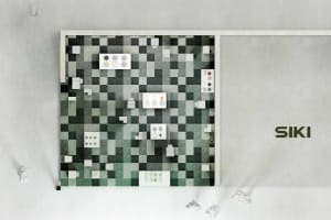A detailed industrial floor-plan with a tile pattern.