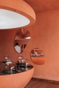 Modern retail store with glass and curved architectural elements.