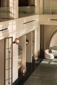 Modern interior space featuring luxury materials like marble and glass.