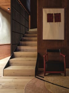 Wooden residential interior with minimalist design elements.