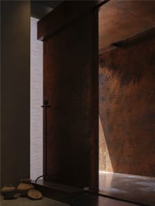 Interior space with modern metal-cladding design, featuring a floor-to-ceiling window, polished concrete floor, and minimalis