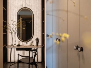 A modern closet interior featuring a fabric-covered wardrobe, a vanity table, and decorative elements such as a vase with yel