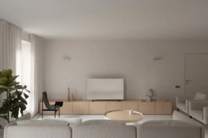 Modern minimalist living room featuring wood furniture, white walls, and a round coffee table.
