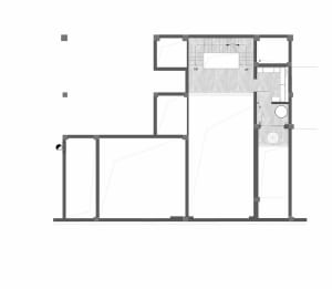 Blueprint of a modern apartment layout showing various rooms and spaces.