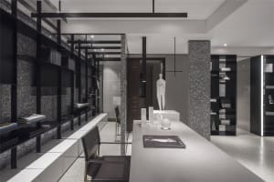 Modern office space with black and white decor, featuring a contemporary interior design.