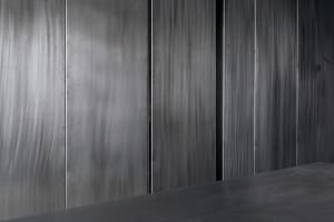 Metal panels in a minimalist interior design setting.
