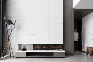 A Minimalist Modern Living Room with Marble and Concrete