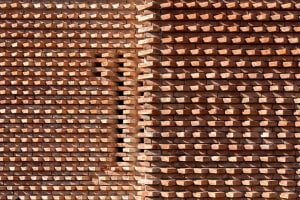A textured brick wall pattern with varied shading