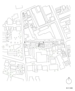 An urban planning site plan with buildings and streets at a 1:1500 scale.