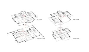 Floor plan of a residential building with multiple levels and designated areas.
