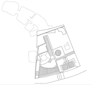 Blueprint of an interior construction plan featuring architectural intersections and design elements.