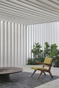 A modern interior living space featuring wood material.