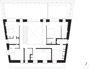 Black and white floor plan of a residential house, showing layout and rooms.