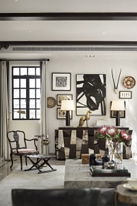 Modern living room featuring mixed materials and contemporary decor.