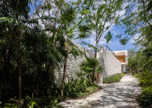 Modern contemporary white walls and concrete roadside view of a building