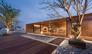 Modern residential space featuring wood materials and contemporary design elements.